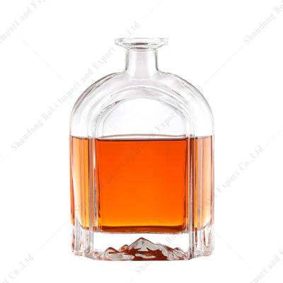 China Unique Shaped Clear Packing Beverage Rum Gin Tequila Whiskey Brandy Vodka Glass Bottle With Cap for sale