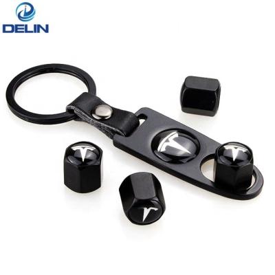 China Universal Black Tire Valve Covers With Key Chain,Key Chain,Wrench,Wrench,Universal Wheel Stem Covers Car Logo Emblem,Air Cover Caps for sale