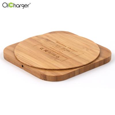 China Mobile Phone Bamboo Wooden Radio Charging Iphone Charger 5w Fast Charging Mobile Phone Rotating Wireless Charger for sale