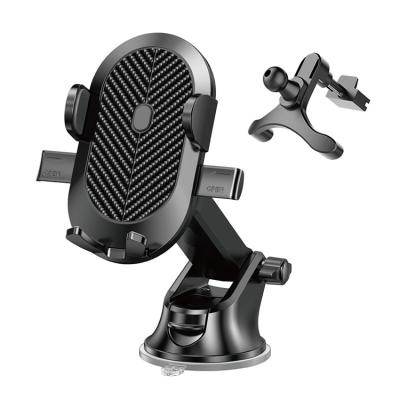 China Flexible 2 in 1 Mount Car Phone Holder Adjustable Dashboard Windshield Vent Carbon Fiber Universal 360 Strong Suction Cup Phone Holder for sale