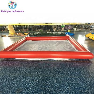 China 0.90mm PVC Tarpaulin/DWF Material Popular Inflatable Sea Pool Inflatable Water Boat Pool With Net for sale