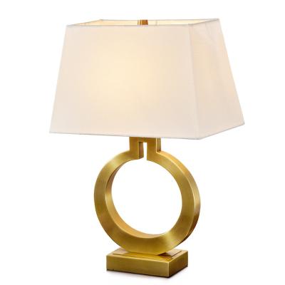 China Hot Cloth Art Simple Golden Art Ironwork Study Lamp Unique European Creative Retro Modern Luxury Decoration Bedside Bedroom Light Lamp for sale