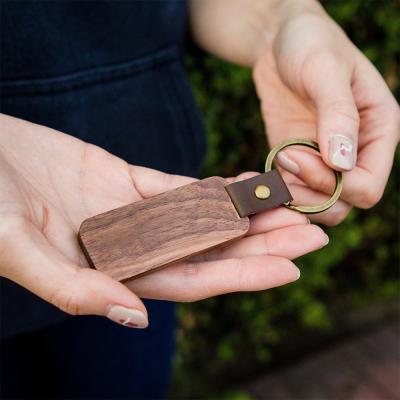 China 2022 Rectangle Wooden Keychain Custom Logo Wooden Handcrafted Wooden Key Chain Keychains for sale