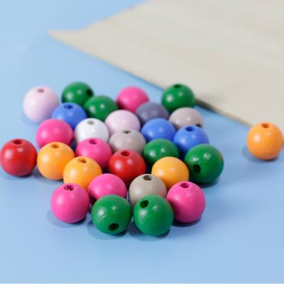 China Eco - Friendly Wholesale Large Round Wooden Decorative DIY Beads 12mm Round Beads for sale