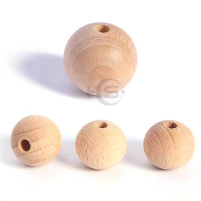 China Eco-friendly Natural 10mm Unfinished Wooden Round Beads Original Color Slices Wooden Ball For DIY Craft for sale