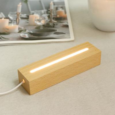 China Eco-friendly USB Wood Base Lamp Led 3D Wood Base Light Round Oval Night Light for sale