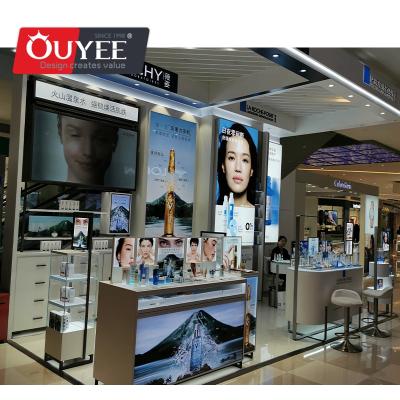 China Eco-friendly Retail Cosmetic Store Showroom Interior Decoration Designs With Wholesale Customized Display Furniture for sale