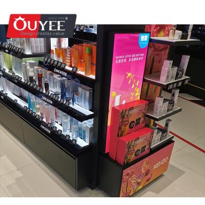 China Eco - Friendly Makeup Shop Interior Design With Modern Customized Cosmetic Shop Display Stand Cabinet for sale