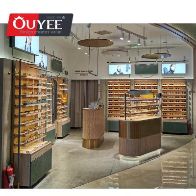 China Latest Popular Optical Store Optical Shop Interior Designed Wooden Customized Glasses Showcases Cabinet Showcase for sale