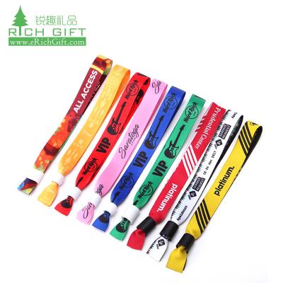 China Eco-friendly adjustable custom elastic fabric woven wristband wholesale multifunctional polyester satin silk screen printing festival for events for sale