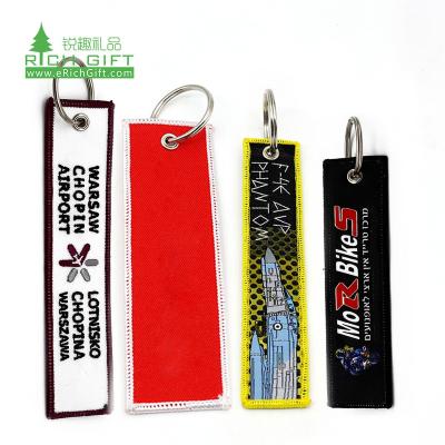 China Promotion gift best selling twill double sided souvenir polyester aircraft motorcycle fabric custom car woven logo embroidery key chain for sale