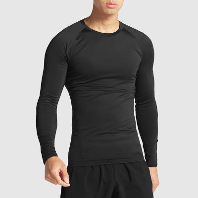 China QUICK DRY Mens Gym Fitness Workout Simple Black White Compression Tops Long Sleeve O Neck T-Shirts for sale