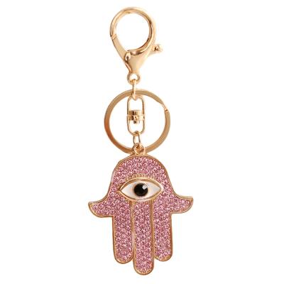 China Crystal+Metal Jewelry New Arrivals Rhinestone Alloy Full Rhinestone Hamsa Hand Pendant Metal Key Chains Evil Eye Key Chain For Party Gifts for sale