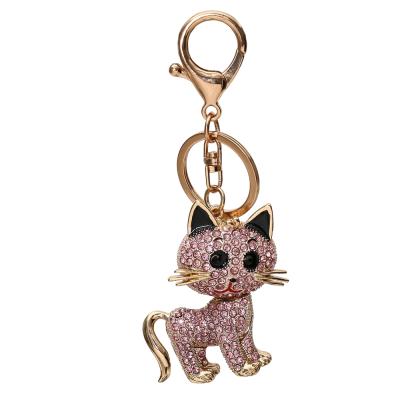 China Hot Selling Crystal+Metal Custom Full Rhinestone Alloy Rhinestone Fashion Cartoon Pendant Metal Key Chain Diamond Key Rings For Charm Bag for sale