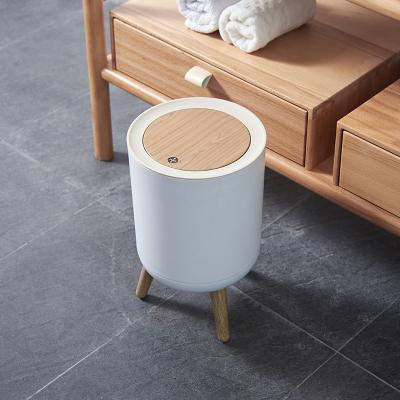 China Nordic style plastic livable plastic trash can press lid round shape imitation foot imitation wood grain trash cans household for sale