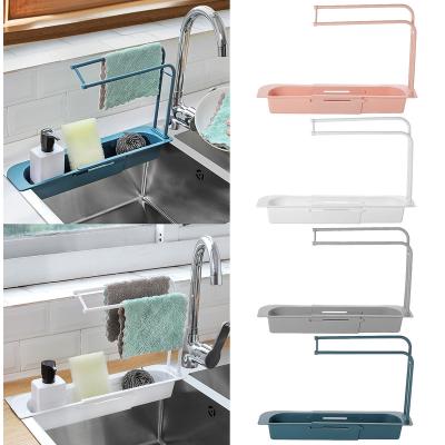 China Telescopic Sink Storage A927 Drain Basket Organizer Kitchen Soap Sponge Holder Sink Drain Shelf Viable Expandable Basket Storage for sale