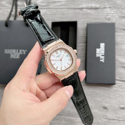 China New Fashion Nautilus Alloy New Diamond Calendar Quartz Watch Men's Watch Women's Watch for sale