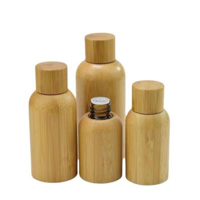 China New Style 10ml 30ml 50ml 100ml Personal Care Bamboo Essential Oil Bottle With Lid for sale