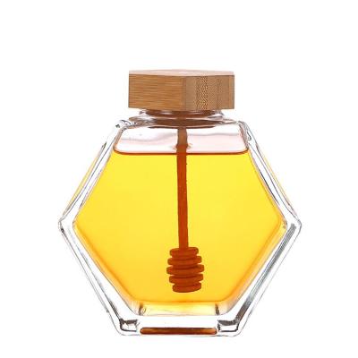 China High Quality 220ml 380ml Freshness Honey Jar Storage Storage Glass Bottle Glass with Wooden Honey Stick Spoon for sale