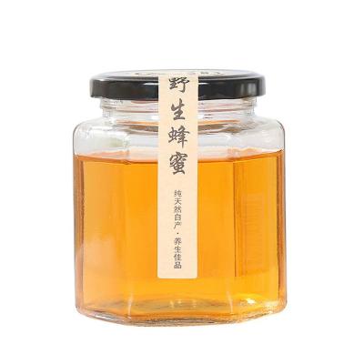 China Empty Honey Glass Jar Glass Jar Square Storage Freshness Preservation Food Glass Bottle With Metal Lid for sale