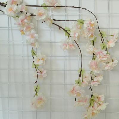 China Home Decor Vines Machine Handmade Half Wedding Party Hanging Silk Flowers Garland Artificial Cherry Blossom Flower for sale