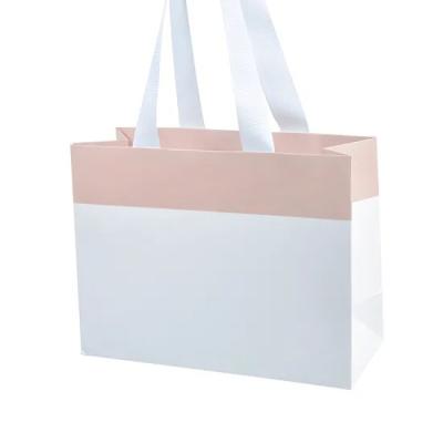 China Custom Logo Cute Decorative Recyclable Thank You Craft Paper Shipping Gift Bag With White Print for sale