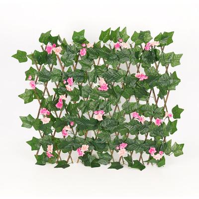 China Decorate Trellis Fence Garden Plant Fence Leave Expanding Retractable Artificial Garden Fence for sale