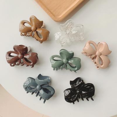 China Fashion 8.5cm Wholesale Women's Korean Fashion Central Statistical Institute of Yucat Plastic Luminous Plastic Hair Claws Clips Arc Shape Resin Hair Clip Accessories for sale