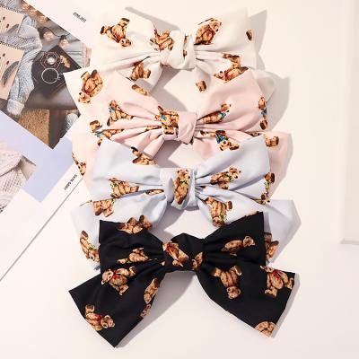 China Bear Yucat Women New Fashion Hair Accessories Wholesale Korean Printing Bear Bowknot Butterfly Hair Clips for sale