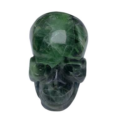 China China wholesale beautiful hand carved green fluorite skulls for fengshui and home decoration for sale