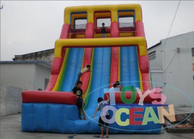 China Blue / Red Double Inflatable Slides 24 Ft 0.55mm PVC Vinyl Tarpaulin For Rental for sale