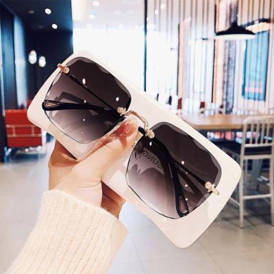 China Hot Selling Metal Shades Fashion Pink Sun Glasses Square Sun Glasses Women Rimless Luxury Metal Shades Glasses for sale