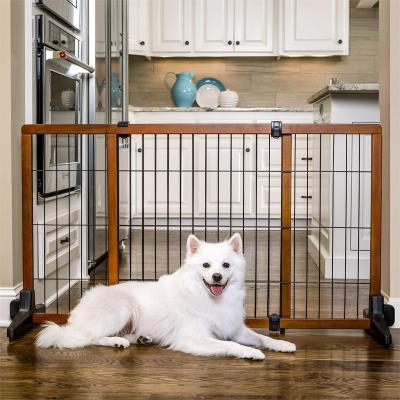 China Sustainable Wide sturdy Adjustable Freestanding Pet Gate,Premium solid wooden dog barrier durable wood and steel design for sale