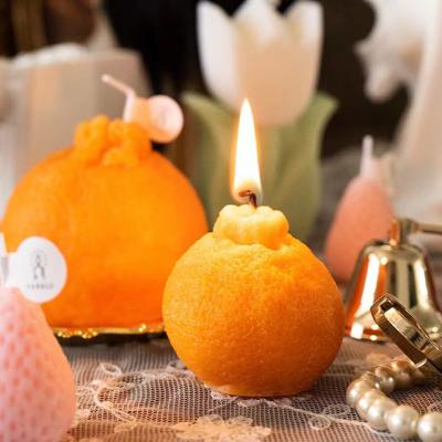 China Birthdays Wholesale Decorative Orange Pillar Candles For Living Room for sale