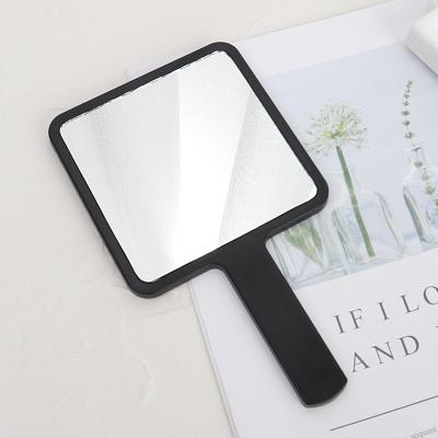 China Magnifying Manufacturers Head Square Portable Advertising Makeup Hand Held Beauty Mirror for sale