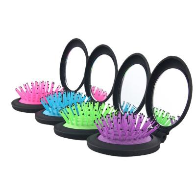 China Portable Folding Travel Oval Boutique Comb Gift Massage Hair Brush Plastic Mirror for sale