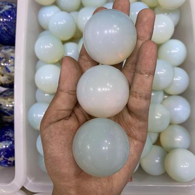 China Colcour Wholesale Crystal Ball Opal Sphere Stunning Polished High Quality Egg White From China for sale