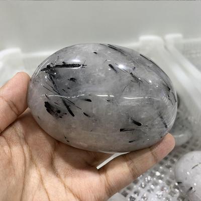 China China Wholesale Natural Black Hair Rutilated Quartz Tourmaline Crystal Polished Quartz Palmstone for sale