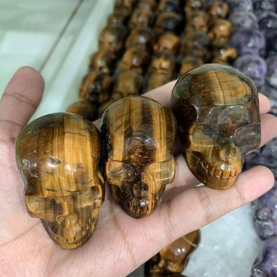 China Wholesale High Quality Natural Crystal Carving Polished Tiger Eye Gemstone Skulls From China for sale