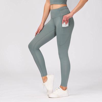 China Comfortable Active Wear Women's Breathable Yoga Pants Gym Workout Leggings With Pocket for sale