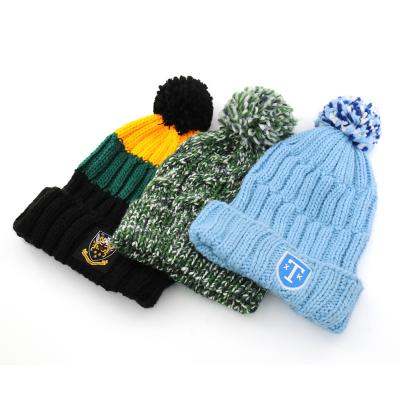 China COMMON Fashion Winter Knitted Beanie Women Hat Wholesale Winter High Quality Custom Women Pom Pom Beanie for sale