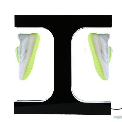 China Retail stores wholesale cheapest double floating shoe display levitating a pair of shoes show magnetic double floating shoe display for sale