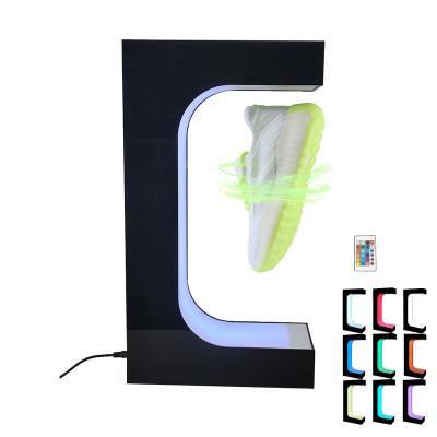 China Cheapest Wholesale Retail Stores Remote Change LED Rotating Display Floating Levitating Shoe Display Rotating Sneaker Magnetic Levitation for sale