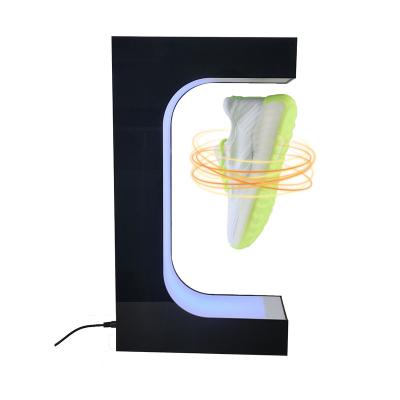 China Retail Stores Drop Shipping Rotating LED Light Levitating Shoes Stand Floating Display Levitating Magnetic Sneaker for sale