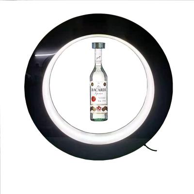 China Retail Stores O Shape Spinning Bottle Display Magnetic Floating Acrylic Display Rack For Display Levitating Bottle Spinning Bottle for sale