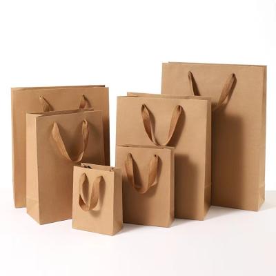 China Recyclable Brown Custom Paper Bag Coffee Logo Kraft Paper Wine Kraft Paper Gift Bags for sale