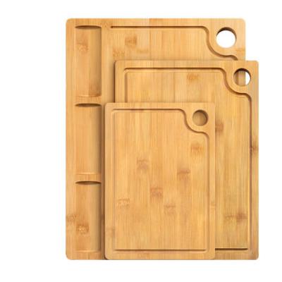 China 2021 Eco-Friendly Choppers With Storage Basket Natural Bamboo Large Cutting Board With Drip Juice Groove for sale