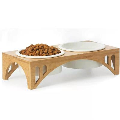 China Factory Direct Sustainable Pet Cats And Dogs Bamboo Feeder Stand With Two Ceramic Bowls for sale