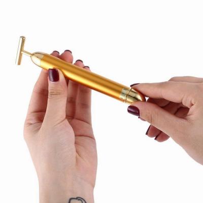 China Vibrating Wrinkle Remover 24k Gold Beauty Stick Roller Massager Beauty Facial Skin Tightening Machine Beauty Bar for sale