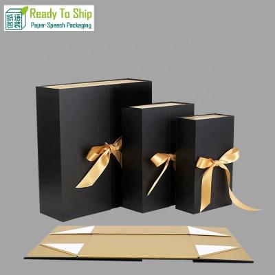 China Handmade Luxury Book Shaped Rigid Double Door Gold Black Silver Cardboard Foldable Gift Box With Ribbon Custom Logo Printing for sale